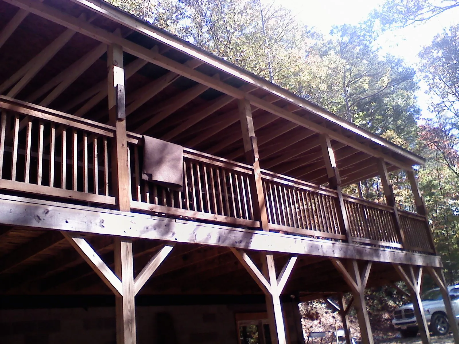 Timber framing under a new elevated porch and deck — Roof Leak Repair in East Wakefield by Roofing Brothers